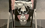 Sciatica Begone ~ Self Portrait as Bela Lugosi on Inversion Table